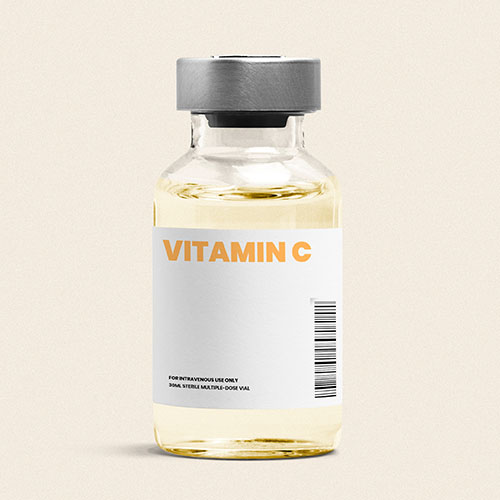 Vitamin C injection in a glass bottle vial with yellow liquid